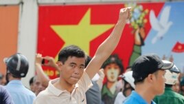 365552f0-0da4-4b9a-a8be-52adc2580f0b_w268_r1 Biểu tình chống Trung Quốc tại TPHCM, ngày 18/5/2014.